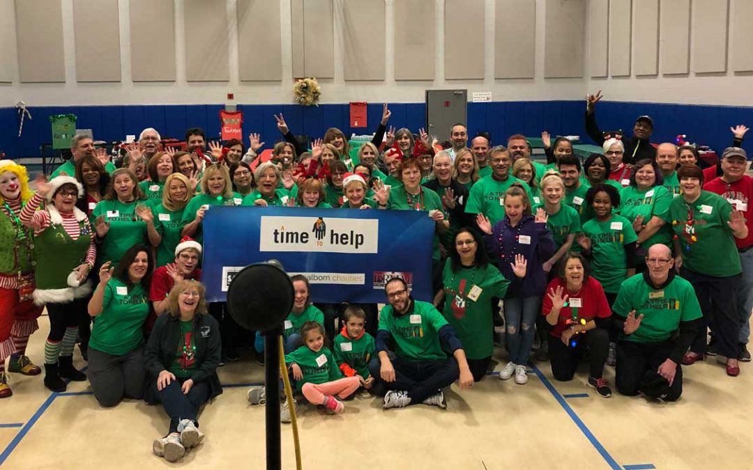 Volunteers ring in the holidays at Salvation Army Harbor Light